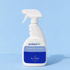 A white trigger spray 750ml bottle of protectME Premium Fabric Protector, set against a solid light blue background.
