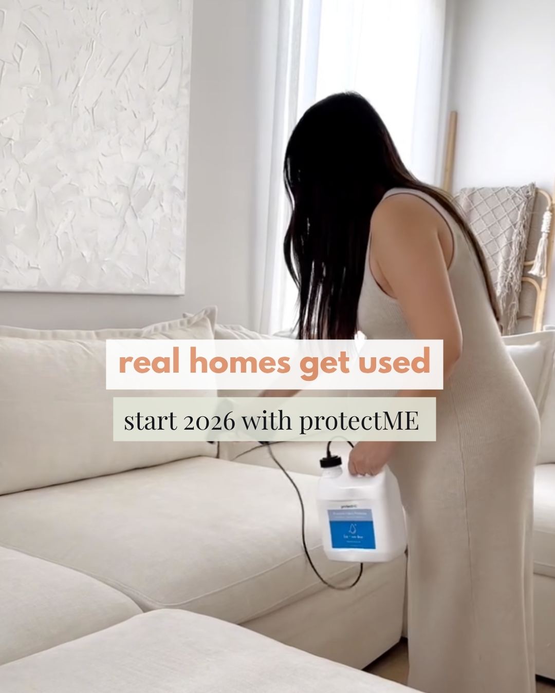 Woman using a device labeled 'protectME' in a living room setting.